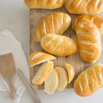 Fresh baked bread on cutting board.